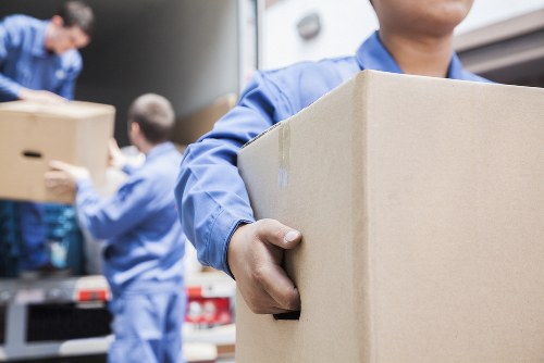Removal van and packed boxes prepared for a local Ealing move