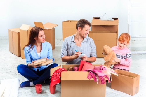 Packed boxes and furniture ready for an organised unpacking service