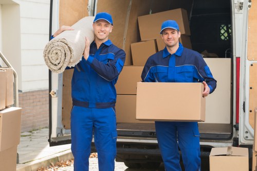 Boxes and household items being organised for transport
