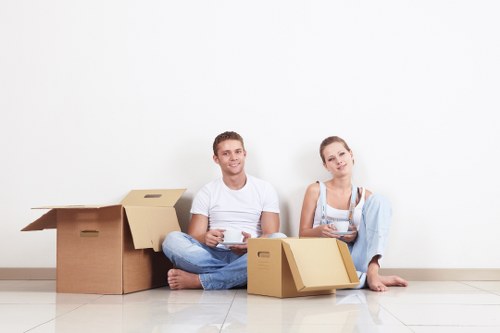 Careful loading of household items into a moving van