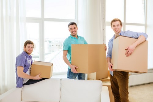 Loading furniture into a local removal van in West London