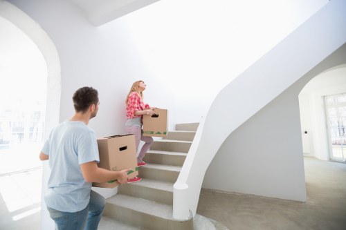Packed boxes and furniture ready for a house move in Ealing