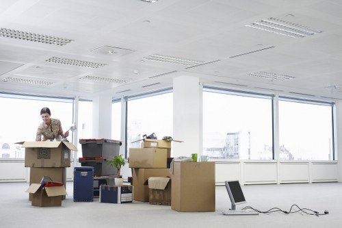 Packed boxes and furniture ready for relocation in Ealing